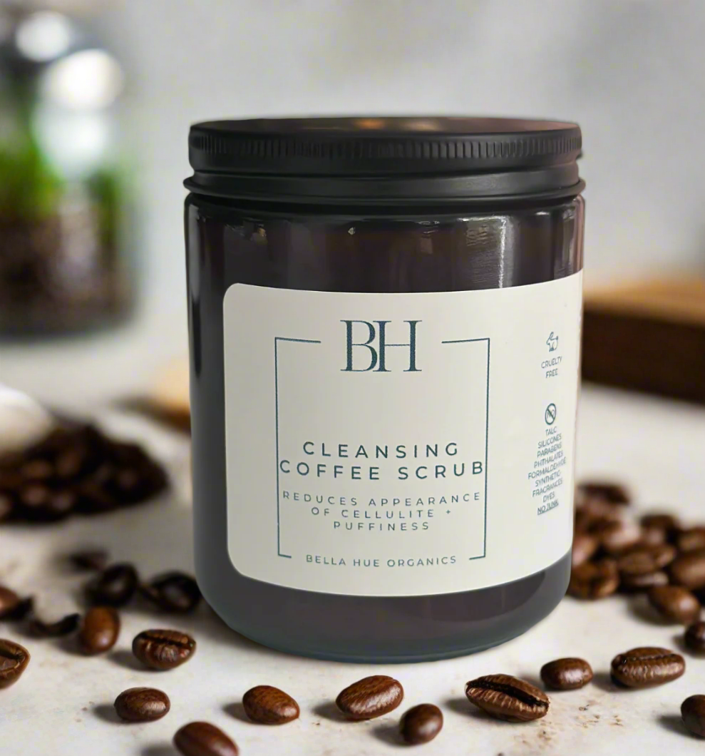 Jar of cleansing coffee scrub with 'BH' branding on a neutral background