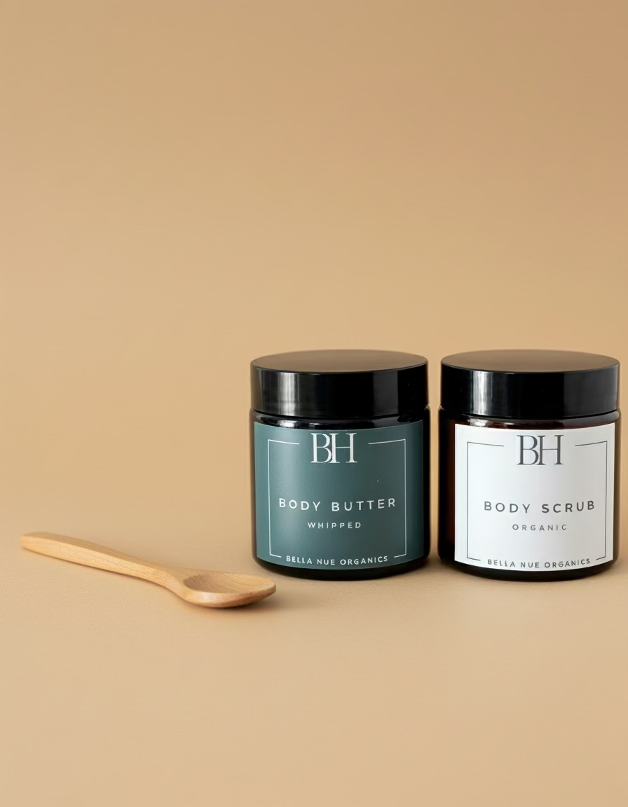 Two cosmetic jars labeled 'BH' with a wooden spoon on a white background